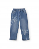 Pantalón vaquero para niño en azul con estampado de palmeras