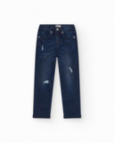 Pantaloni in denim blu scuro per bambino con effetto vissuto.