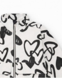 Giacca bambina in bianco con stampa di cuori