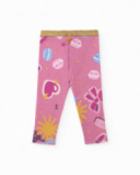 Leggings in maglia per bambina colore rosa con stampa di macarons.