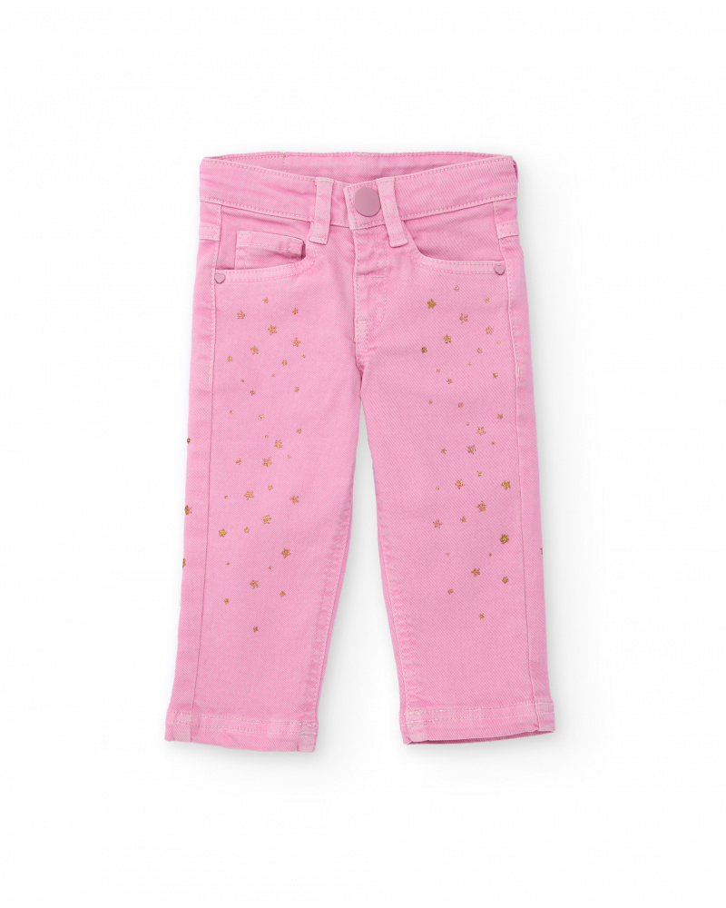 Pantaloni lunghi in twill stretch per bambina colore rosa con stampa di stelline dorate.