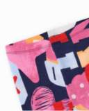 Leggings multicolore per bambina con stampa di cupcake, cuori e lettere.