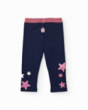 Leggings blu navy per bambina con stampa di stelle multicolori e cintura elastica rosa brillante.