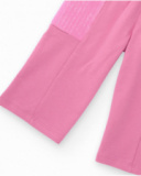 Pantalone rosa per bambina con tasche laterali con paillettes e cintura regolabile.