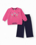 Completo per bambina con felpa rosa con design di mostro e pantaloni blu navy.