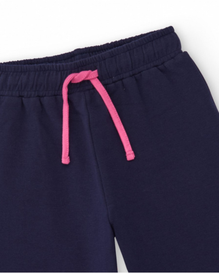 Completo per bambina con felpa rosa con design di mostro e pantaloni blu navy.