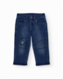 Pantaloni in denim blu per bambino con ricamo di dinosauro.