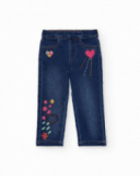 Jeggings in denim per bambina con ricami di cuori e fiori.
