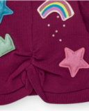 Maglietta a manica lunga per bambina in bordeaux con nodo e applicazioni brillanti