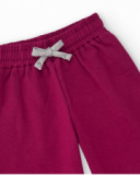 Completo da bambina con giacca floreale e pantaloni fucsia