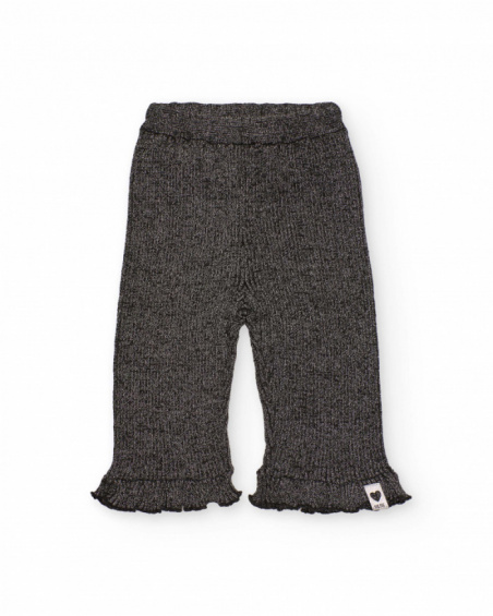 Pantaloni in maglia per bambina in grigio con volant sull’orlo.