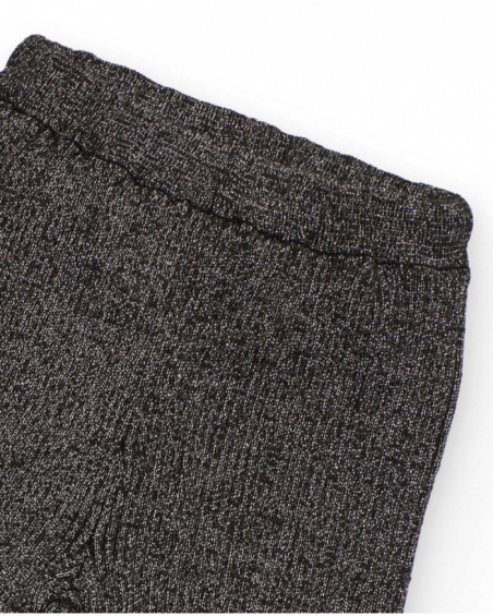 Pantaloni in maglia per bambina in grigio con volant sull’orlo.