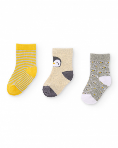 Set di tre calzini per neonato nei toni del giallo, beige e grigio con stampe divertenti