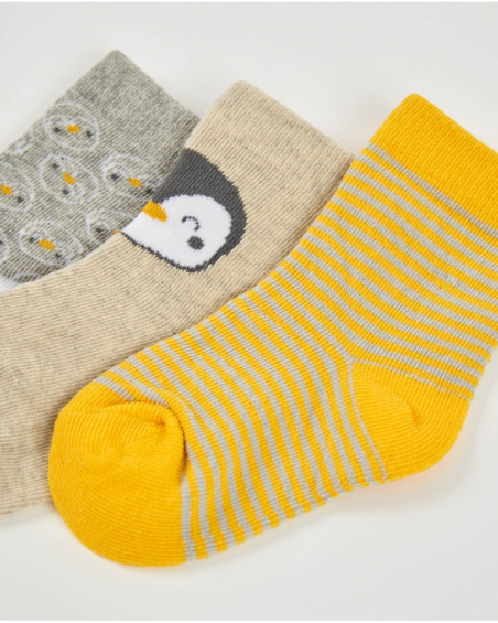 Set di tre calzini per neonato nei toni del giallo, beige e grigio con stampe divertenti