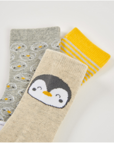 Set di tre calzini per neonato nei toni del giallo, beige e grigio con stampe divertenti