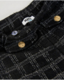 Pantaloni in tweed nero a quadri grigi per bambina