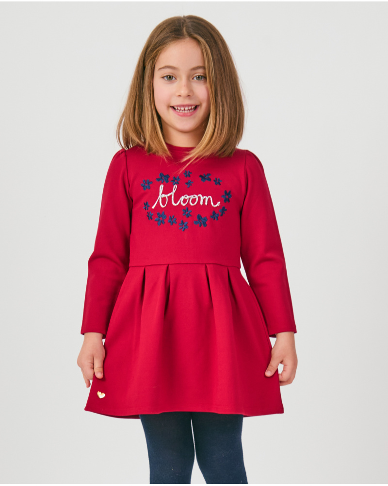 Vestito per bambina color bordeaux con dettaglio ricamato.