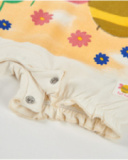 Pagliaccetto in maglia per neonato con dettaglio a volant