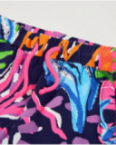 Short da bambina in maglia con volant