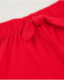 Short da bambina in maglia con volant al fondo