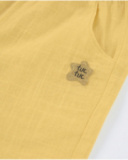 Pantaloni da bambina in tessuto con taglio culotte