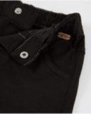 Pantaloni da bambino in tessuto con materiale resistente