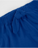 Short da bambina in maglia con volant sul fondo