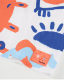 T-shirt da bambino in maglia con chiusura sulla spalla