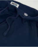 Shorts da bambina in maglia con volant al fondo