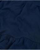 Shorts da bambina in maglia con volant al fondo