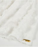 Vestito da bambina tinta unita con decorazioni floreali