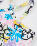 Top da bambina in maglia con spalline sottili incrociate