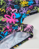 Costume intero da bambina in maglia con aperture laterali