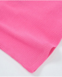 Top da bambina in maglia con spalline sottili incrociate