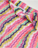 Gonna da bambina in maglia con righe ondulate