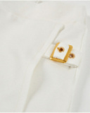 Gonna pantalone da bambina in maglia con fibbia decorativa