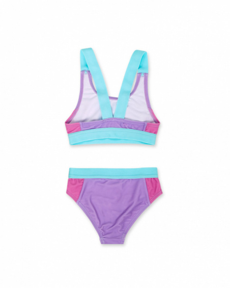 Garota de biquíni esportivo roxo Paradiso beach