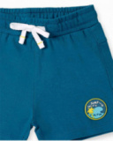 Bermudas de menino em malha azul escuro Coleção Laguna Beach