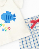 Conjunto para niño con camiseta blanca y shorts