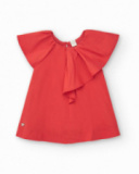 Vestido naranja para niña con volantes
