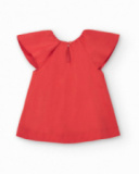 Vestido naranja para niña con volantes