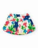 Falda para niña en blanco con estampado tropical multicolor