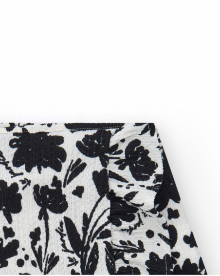 Saia para menina na cor branca com estampa floral e babado.