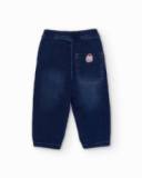 Calça jeans para menina em azul com estampa de estrelas.