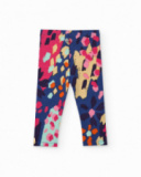 Leggings para menina com estampa de manchas multicoloridas.