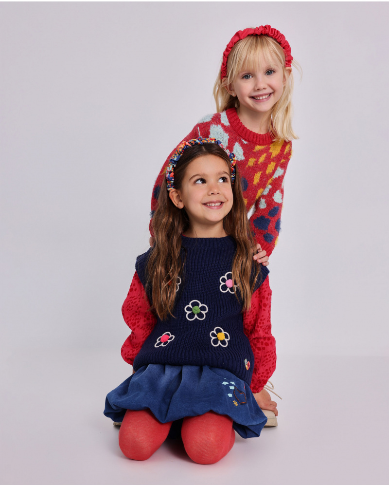 Saia jeans para menina com estampas coloridas de flores e