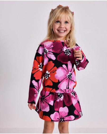 Vestido para menina com estampa floral em fúcsia.